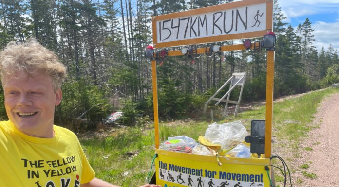 The Fellow in Yellow passes through Strait Area, advocating for those with mobility issues