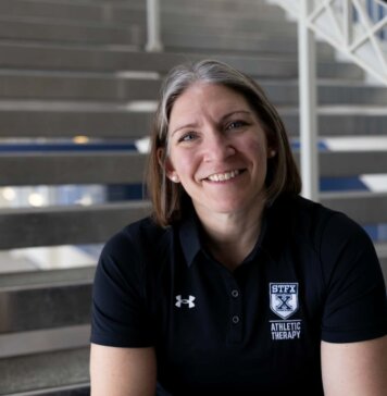 Coach Ouimet wins national praise