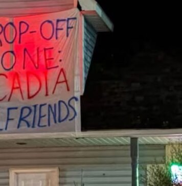 Homecoming sign sparks calls for education, accountability