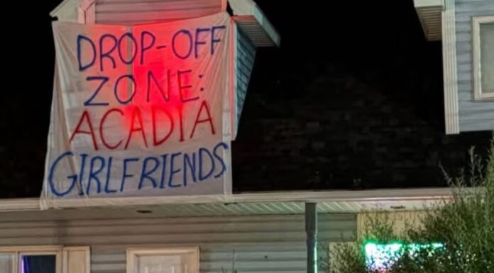 Homecoming sign sparks calls for education, accountability